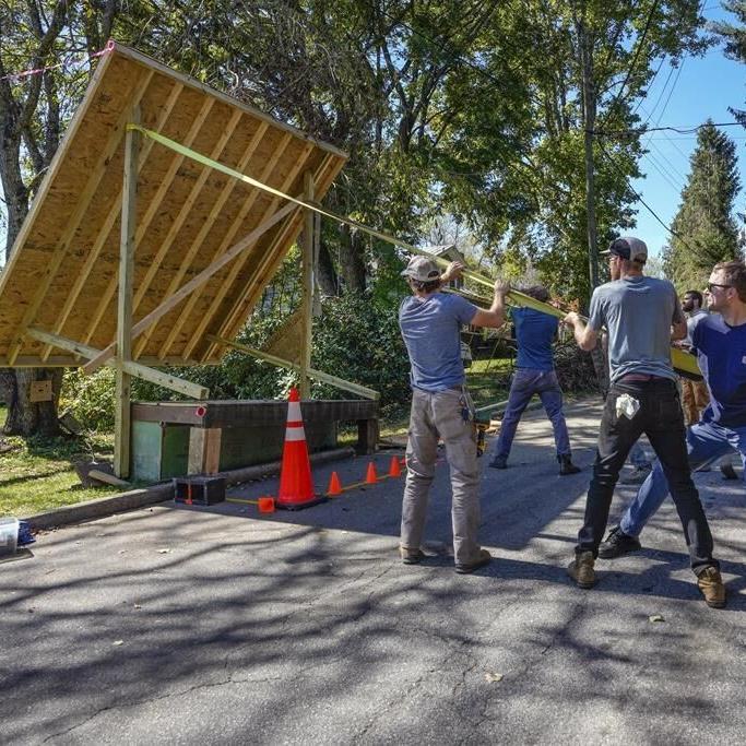 After hurricane, with no running water, residents organize to meet a basic need